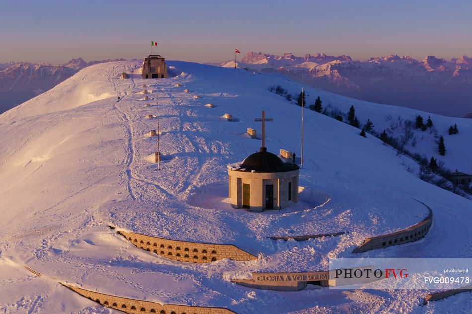 Aerial view of Ossuary to the fallen of Cima Grappa in the depths of winter at sunset