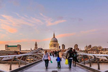 Millennium Bridge and St. Paul's Cathedral with tourist