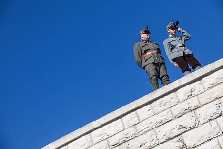 Troops in uniform during historical memorial to the fallen of Cima Grappa