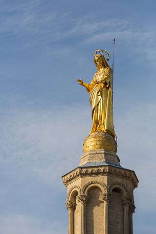 Life statue of the Virgin Mary on the bell tower of the Cathedral of Avignon Life statue of the Virgin Mary on the bell tower of the Cathedral of Avignon