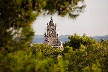 The clock tower of the city hall of Avignoe