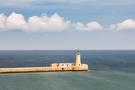 St. Elmo Breakwater Lighthouse, Grand Harbor, La Valletta, capital city of the island of Malta.