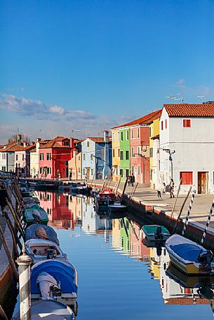 Colorful houses in Burano with canal and moored boats, Venice, Venetian lagoon, Veneto, Italy, Europe