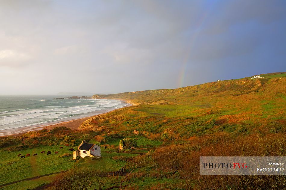 Bucolic view and rainbow in the notheern coast of Northern Ireland