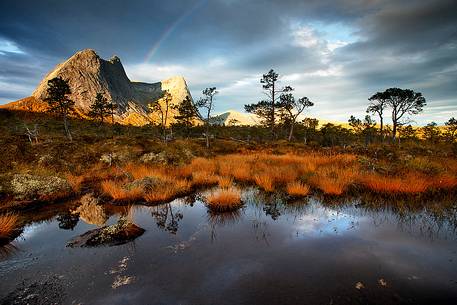 Raibow, rocky mountains and autumn colors in Nordland region, northern Norway. Raibow, rocky mountains and autumn colors in Nordland region, northern Norway.