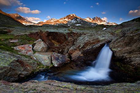 Amazing hidden waterfall in Stelvio National Park.
