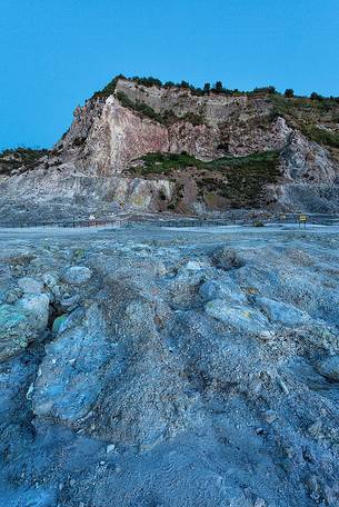 Solfatara is a shallow volcanic crater at Pozzuoli, near Naples, part of the Campi Flegrei volcanic area