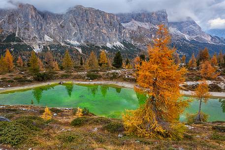 Autumn in lake Limides (or Limedes), and in the background Tofana mountains
