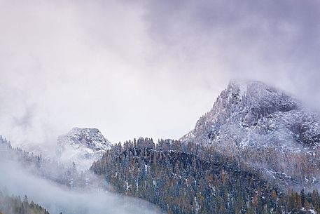 Dolomiti of Brenta,Natural Park of Adamello-Brenta, mountains through the fog Dolomiti of Brenta,Natural Park of Adamello-Brenta, mountains through the fog