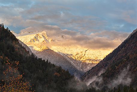 Dolomiti of Brenta,Natural Park of Adamello-Brenta, mountains through the fog Dolomiti of Brenta,Natural Park of Adamello-Brenta, mountains through the fog