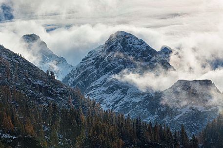 Dolomiti of Brenta,Natural Park of Adamello-Brenta, mountains through the fog Dolomiti of Brenta,Natural Park of Adamello-Brenta, mountains through the fog