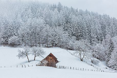 Snowy barn near Bad Kleinkirchheim, Carinthia, Austria, Europe