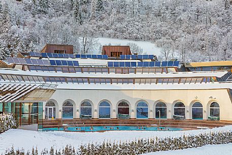 Tourists in the outdoor pool of Romerbad spa, Bad Kleinkirchheim, Carinthia, Austria