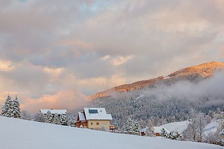 The snowy village of Bad Kleinkirchheim at sunset, Carinthia, Austria, Europe