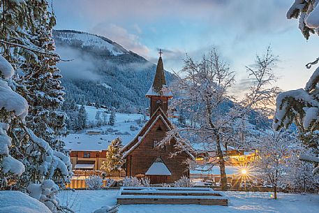 Winter view of the Evangelican church in Bad Kleinkirchheim at twilight, Carinthia, Austria, Europe