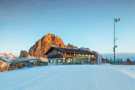 Scoiattoli mountain hut and Tofana mount in a winter sunset, Cortina d'Ampezzo, dolomites, Veneto, Italy, Europe