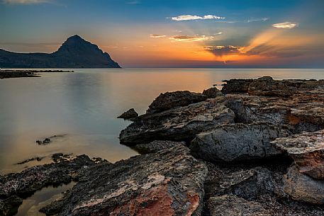 Sunset from the Monte Cofano nature Reserve, in the background the Monte Cofano  peak, Trapani, Sicily, Italy
