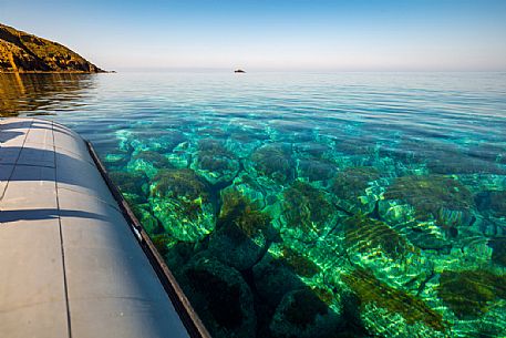 Boat trip in the transparent water of the sea, Ustica sea, Sicily, Italy