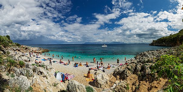 Tourists at the Cala Tonnarella dell'Uzzo, Zingaro Natural Reserve, San Vito Lo Capo, Sicily, Italy, Europe