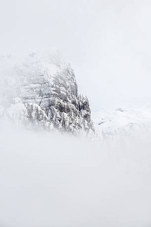 Monte Poviz peeps out from fog