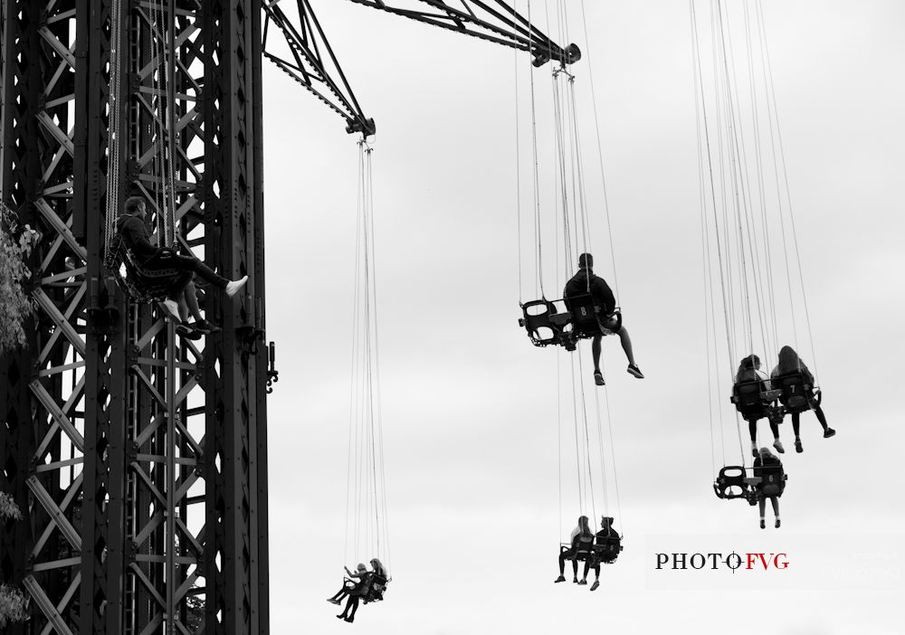 People at the World's Tallest Chairoplane called Praterturm at the Prater Amusement Park, Vienna. Austria.