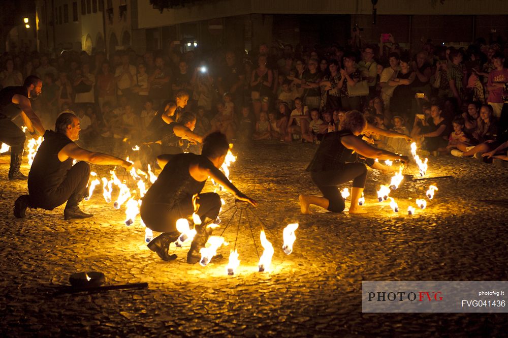 At the historical re-enactment of Macia in Spilimbergo, people play juggling games with fire, Friuli Venezia Giulia, Italy