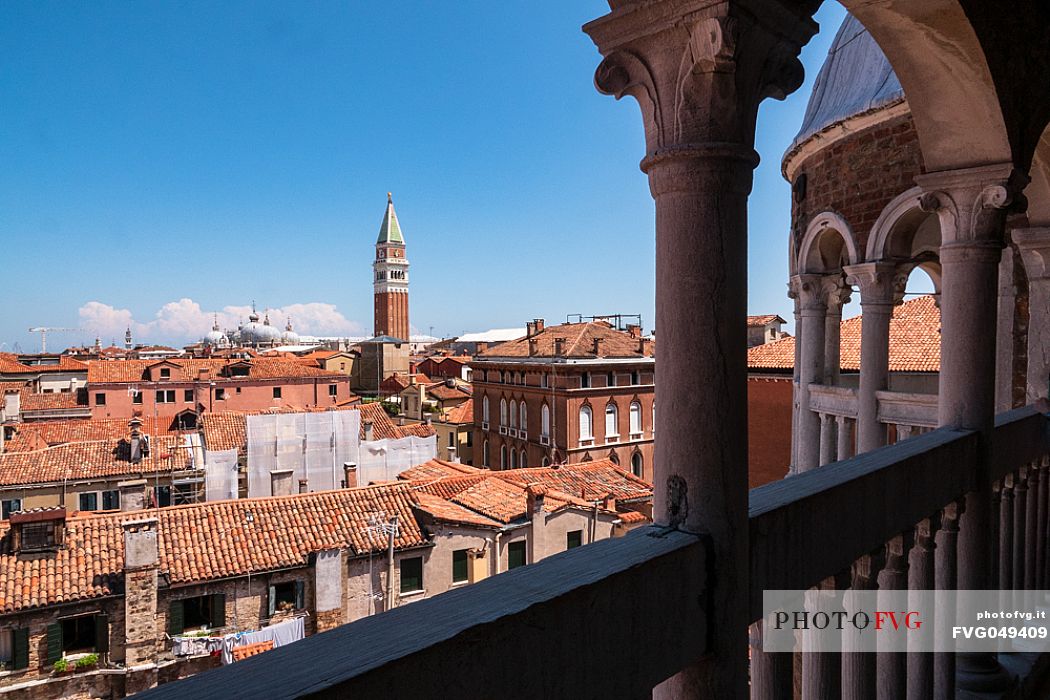 The bell tower and the Cathedral of San Marco in Venice seen from the spiral staircase of Palazzo Contarini del Bovolo, a late Gothic building located in the San Marco district. Italy