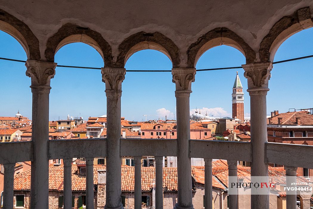 The bell tower and the Cathedral of San Marco in Venice seen from the spiral staircase of Palazzo Contarini del Bovolo, a late Gothic building located in the San Marco district. Italy