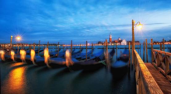 Evening's lights on the gondolas in St. Mark's basin in Venice, in the background the Church of San Giorgio Maggiore, Venice, Italy, Europe