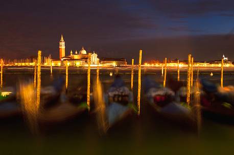 Gondolas in St. Mark's basin in Venice, in the background the Church of San Giorgio Maggiore by night, Venice, Italy, Europe