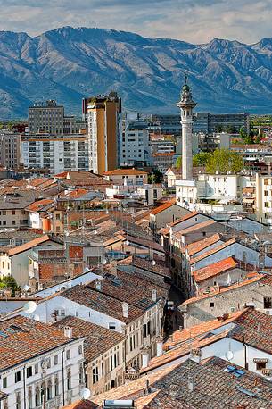 Pordenone, Corso Emanuele II and the Bell Tower of St. George. In the background the Prealps of Friuli. Friuli Venzia Giulia, Italy, Europe