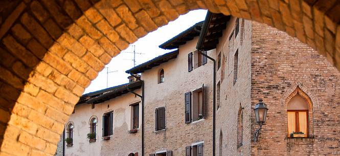 Historic buildings in Piazza Libertà Square in Valvasone, Friuli Venezia Giulia, Italy, Europe Historic buildings in Piazza Libertà Square in Valvasone, Friuli Venezia Giulia, Italy, Europe