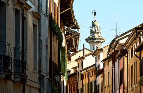Corso Vittorio Emanuele in Pordenone, the background the bellmtower of San Giorgio, Friuli Venezia Giulia, Italy, Europe