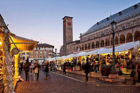 Christmas markets in Piazza della Frutta in Padua, in the background the Palazzo della Ragione, Veneto, Italy, Europe