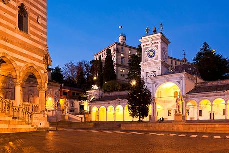 Loggia di San Giovanni, the Renaissance portico surmounted by a clock tower and in the background the castle, Piazza della Libert, Udine, Friuli Venezia Giulia, Italy, Europe 
