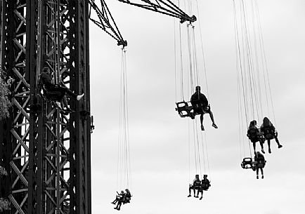 People at the World's Tallest Chairoplane called Praterturm at the Prater Amusement Park, Vienna. Austria.