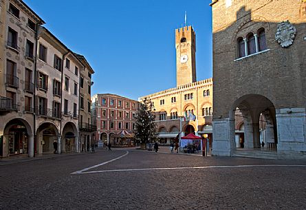 Piazza dei Signori square in Treviso with the Palazzo dei Trecento on the right; in the background the Palazzo del Podestà with the civic tower, Veneto, Italy, Europe