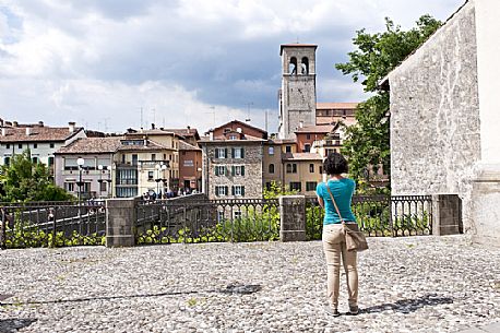 Tourist looks the skyline of Cividale del Friuli village, Unesco world Heritage, Friuli Venezia Giulia, Italy, Europe