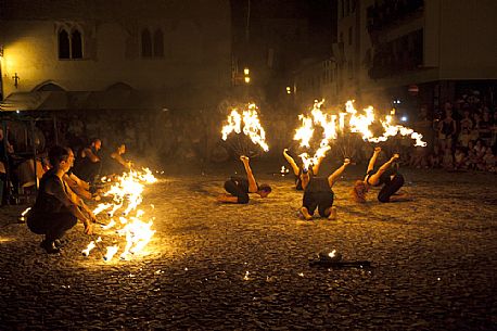 At the historical re-enactment of Macia in Spilimbergo, people play juggling games with fire, Friuli Venezia Giulia, Italy