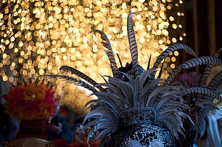 Original hats, feathers and lights of the Venice Carnival, Italy, Europe
