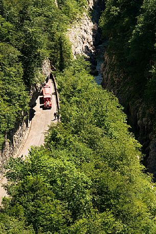 The tourist train of Valcellina, in the province of Pordenone, which runs along the old disused road and offers a visit to the suggestive gorge created by the Cellina river. Natural heritage protected as a nature reserve. Italy
