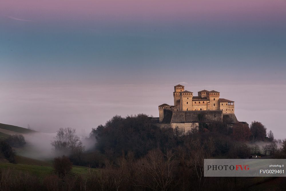Torrechiara castle in the fog, Langhirano, Emilia Romagna, Italy