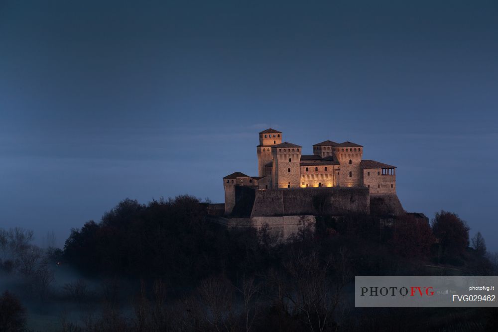 Torrechiara castle at twilighit, Langhirano, Emilia Romagna, Italy