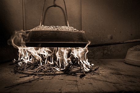 Cooking of Pattona of chestnuts , traditional food of Lunigiana, Emilia Romanga