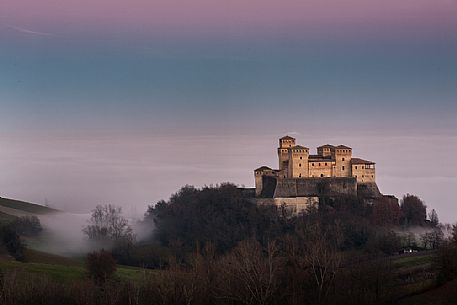 Torrechiara castle in the fog, Langhirano, Emilia Romagna, Italy