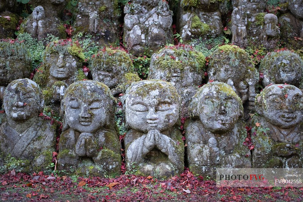 Some of the 1200 Rakan statues in Otagi Nenbutsu-ji temple in Arashiyama, Kyoto, Japan