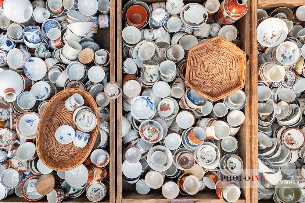 Japanese cups and pots at Tenjin Ichi flea Market, Kyoto, Kitano Tenmangu Shrine. This is one of Kyoto biggest antiques market, Japan