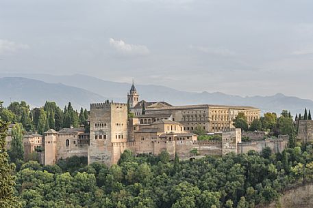 Alhambra palace seen from the Mirador de San Nicolas, Albayzin quarter, Granada, Spain