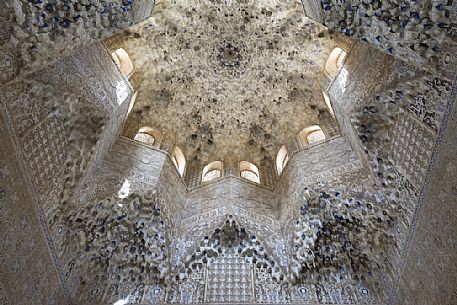 Ceiling hall of the Abencerrajes with its rich nasrid decoration, in the Nazaries palace of the Alhambra, Granada, Spain