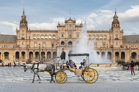 Horse carriage in the center of Plaza de Espana, Seville, Spain